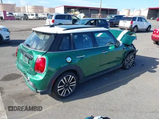 2022 MINI Hardtop 4 Door Cooper S z VIN WMW53DK0XN2R31678, wystawiony jako IAAI lot #41859367 z przebiegiem Nie podano mil oraz . Historia ofert i sprzedaży dostępna na DreamBid. Obrazek 4.