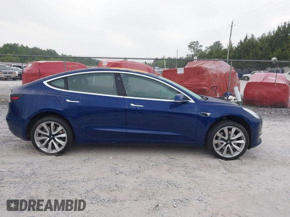 2018 Tesla Model 3 Long Range Battery z VIN 5YJ3E1EBXJF088444, wystawiony jako IAAI lot #42072860 z przebiegiem 46 063 mil mil oraz . Historia ofert i sprzedaży dostępna na DreamBid. Obrazek 13.