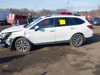 2017 Subaru Outback Touring with VIN 4S4BSETC8H3403963, listed as a IAAI auction lot 41649804 with 71,594 mi miles. Bid and sale history available at carsss.com. Image 14.