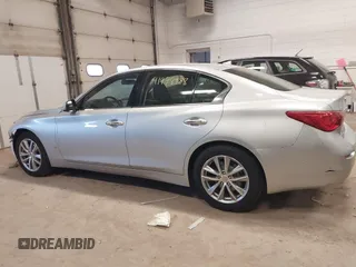 2015 Infiniti Q50 Premium with VIN JN1BV7AR3FM396154, listed as a IAAI auction lot 41978988 with 110,109 mi miles. Bid and sale history available at carsss.com. Image 14.