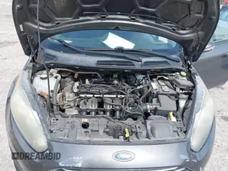2016 Ford Fiesta SE with VIN 3FADP4EJ4GM129006, listed as a IAAI auction lot 42085892 with 146,044 mi miles. Bid and sale history available at carsss.com. Image 10.