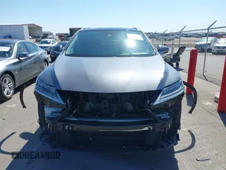 2020 Lexus RX 450h with VIN 2T2JGMDA2LC053394, listed as a IAAI auction lot 41979007 with 56,331 mi miles and . Bid and sale history available at DreamBid. Image 13.