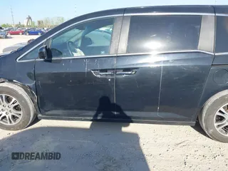 2012 Honda Odyssey EX-L with VIN 5FNRL5H6XCB016801, listed as a IAAI auction lot 42112141 with 164,671 mi miles and . Bid and sale history available at carsss.com. Image 14.