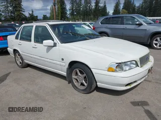 1999 Volvo S70 with VIN YV1LS55A4X1565064, listed as a IAAI auction lot 42009770 with 239,729 mi miles and . Bid and sale history available at DreamBid. Image 1.