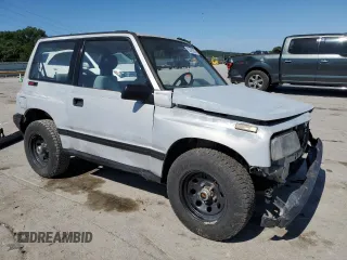 1991 Geo Tracker z VIN 2CNBJ18U3M6909006, wystawiony jako Copart lot #73638944 z przebiegiem 65 033 mil mil oraz Tytuł czysty. Historia ofert i sprzedaży dostępna na DreamBid. Obrazek 4.