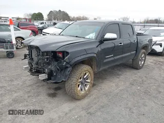 2018 Toyota Tacoma SR with VIN 3TMGZ5AN5JM159932, listed as a IAAI auction lot 41731655 with 138,780 mi miles. Bid and sale history available at carsss.com. Image 2.