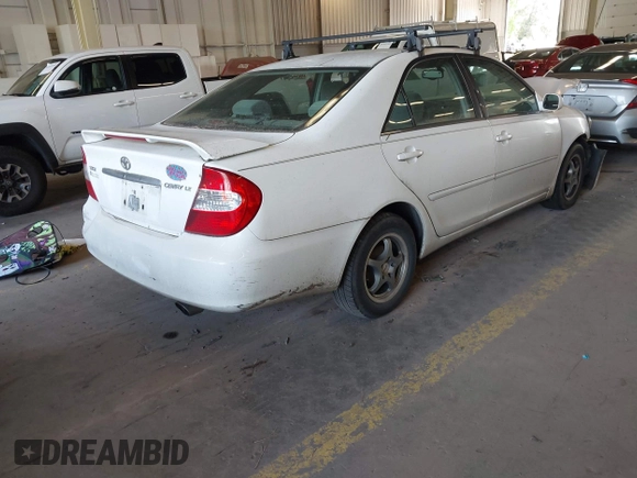 2004 Toyota Camry LE with VIN JTDBE32K540257588, listed as a IAAI auction lot 42208098 with 201,770 mi miles and . Bid and sale history available at DreamBid. Image 4.