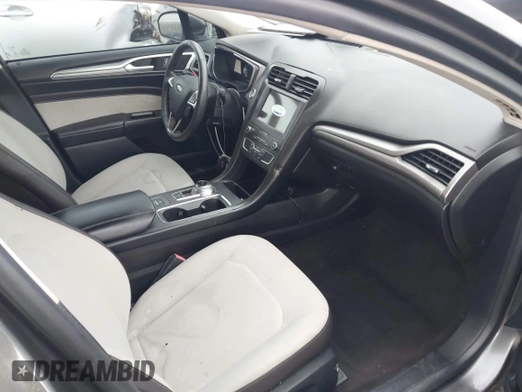 2020 Ford Fusion SE z VIN 3FA6P0HD5LR198744, wystawiony jako IAAI lot #42177820 z przebiegiem 97 520 mil mil oraz . Historia ofert i sprzedaży dostępna na DreamBid. Obrazek 5.