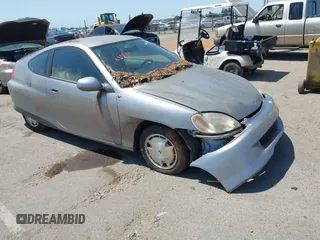 2000 Honda Insight z VIN JHMZE1357YT003654, wystawiony jako IAAI lot #42428076 z przebiegiem 173 445 mil mil oraz . Historia ofert i sprzedaży dostępna na DreamBid. Obrazek 1.