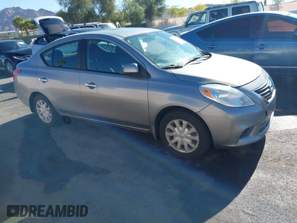 2012 Nissan Versa SV with VIN 3N1CN7AP0CL921230, listed as a IAAI auction lot 42151993 with 184,676 mi miles. Bid and sale history available at carsss.com. Image 1.