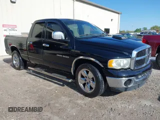 2004 Dodge 1500 SLT with VIN 1D7HA18N04J275525, listed as a IAAI auction lot 42010264 with 197,017 mi miles. Bid and sale history available at carsss.com. Image 1.