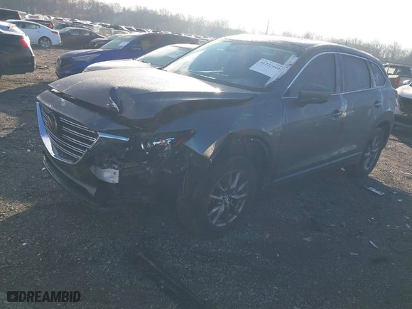 2022 Mazda CX-9 Touring with VIN JM3TCBCYXN0605336, listed as a IAAI auction lot 41222449 with 45,562 mi miles. Bid and sale history available at carsss.com. Image 2.