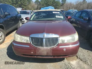 2001 Lincoln Town Car Cartier z VIN 1LNHM83WX1Y732737, wystawiony jako Copart lot #48216445 z przebiegiem 103 262 mil mil oraz Szkoda całkowita • Salvage title. Historia ofert i sprzedaży dostępna na DreamBid. Obrazek 5.