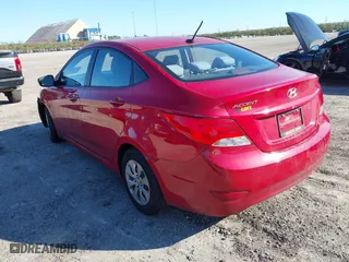 2015 Hyundai Accent GLS with VIN KMHCT4AE8FU833113, listed as a IAAI auction lot 40975977 with 143,038 mi miles. Bid and sale history available at carsss.com. Image 3.