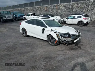 2019 Honda Civic EX-L z VIN JHMFC1F7XKX000981, wystawiony jako IAAI lot #41799260 z przebiegiem 68 455 mil mil oraz . Historia ofert i sprzedaży dostępna na DreamBid. Obrazek 1.