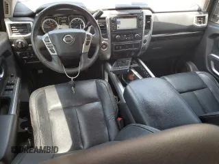 2017 Nissan Titan SV z VIN 1N6AA1E68HN500682, wystawiony jako Copart lot #57562415 z przebiegiem 185 539 mil mil oraz Szkoda całkowita • Salvage title. Historia ofert i sprzedaży dostępna na DreamBid. Obrazek 8.