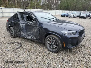 2024 BMW X4 M40i z VIN 5UX43DT09R9U93650, wystawiony jako Copart lot #50173205 z przebiegiem Nie podano mil oraz Szkody całkowita. Historia ofert i sprzedaży dostępna na DreamBid. Obrazek 4.