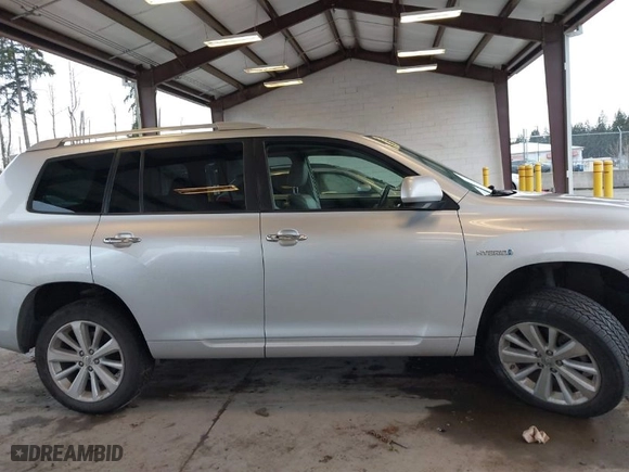 2009 Toyota Highlander Hybrid Limited with VIN JTEEW44A392030847, listed as a IAAI auction lot 41611306 with 137,874 mi miles. Bid and sale history available at carsss.com. Image 13.