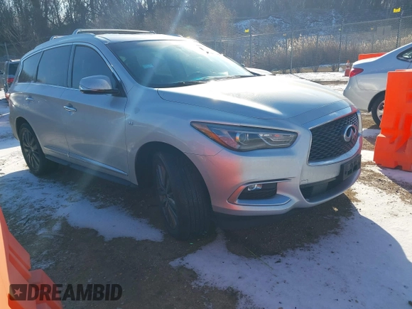 2016 Infiniti QX60 with VIN 5N1AL0MM8GC518533, listed as a IAAI auction lot 41352229 with 100,185 mi miles and . Bid and sale history available at DreamBid. Image 1.