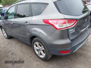 2014 Ford Escape SE with VIN 1FMCU9GX8EUA65568, listed as a IAAI auction lot 42435114 with 128,278 mi miles and . Bid and sale history available at DreamBid. Image 3.