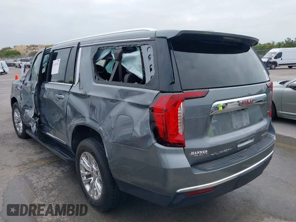 2022 GMC Yukon XL SLT with VIN 1GKS2GKD2NR153790, listed as a IAAI auction lot 41911362 with 84,739 mi miles. Bid and sale history available at carsss.com. Image 3.