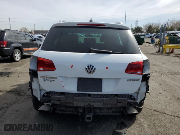 2012 Volkswagen Touareg с VIN WVGEG9BP1CD007581, выставлен на аукционе Copart как лот 47958355 с пробегом 79 649 миль миль и Списание • Salvage title. История ставок и продаж доступна на DreamBid. Изображение 6.