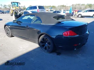 2007 BMW 6 Series 650i with VIN WBAEK13507CN84354, listed as a IAAI auction lot 41604376 with 97,956 mi miles. Bid and sale history available at carsss.com. Image 3.