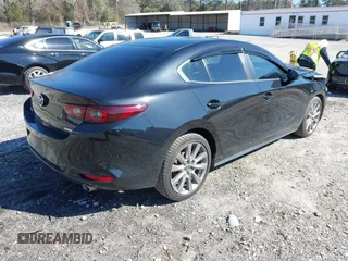 2022 Mazda 3 Select z VIN 3MZBPABL6NM304906, wystawiony jako IAAI lot #41634685 z przebiegiem 48 372 mil mil oraz . Historia ofert i sprzedaży dostępna na DreamBid. Obrazek 4.