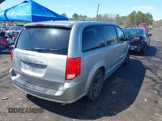 2017 Dodge Grand Caravan SE with VIN 2C4RDGBG9HR732854, listed as a IAAI auction lot 41980430 with 124,726 mi miles and . Bid and sale history available at DreamBid. Image 4.
