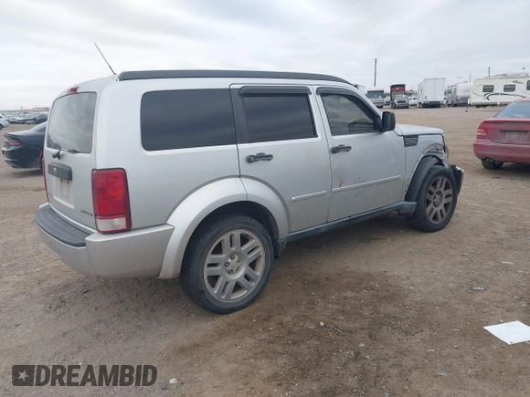 2010 Dodge Nitro SE with VIN 1D4PT2GK8AW144406, listed as a IAAI auction lot 41590691 with 165,959 mi miles and . Bid and sale history available at DreamBid. Image 4.