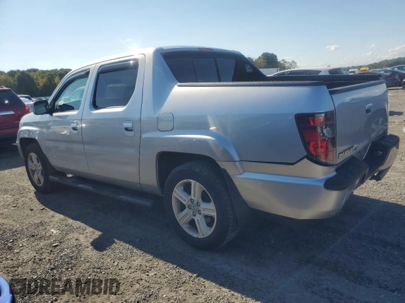 2012 Honda Ridgeline RTL with VIN 5FPYK1F55CB452206, listed as a Copart auction lot 74694204 with 128,226 mi miles and Clean Title. Bid and sale history available at carsss.com. Image 2.