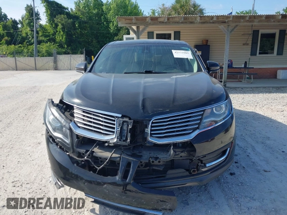 2016 Lincoln MKX Reserve with VIN 2LMTJ6LP9GBL27835, listed as a IAAI auction lot 42175905 with 87,541 mi miles. Bid and sale history available at carsss.com. Image 12.
