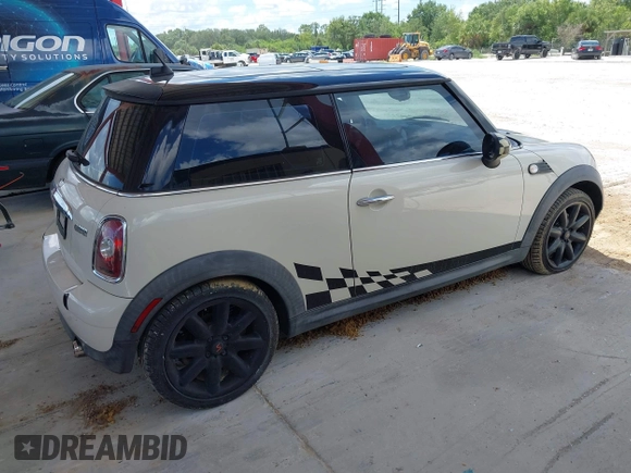 2007 MINI Hardtop with VIN WMWMF33557TL67653, listed as a IAAI auction lot 42581219 with 147,115 mi miles and . Bid and sale history available at DreamBid. Image 4.