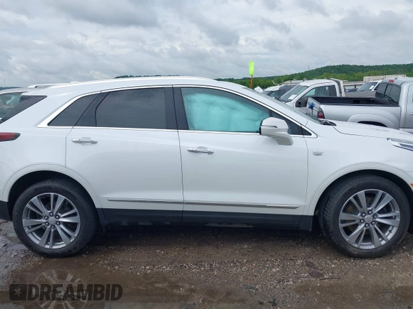2023 Cadillac XT5 AWD Premium Luxury with VIN 1GYKNDRS9PZ199653, listed as a IAAI auction lot 42205799 with 23,751 mi miles and . Bid and sale history available at DreamBid. Image 13.