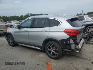 2018 BMW X1 sDrive28i z VIN WBXHU7C32J3H44095, wystawiony jako Copart lot #53780865 z przebiegiem Nie podano mil oraz Szkody całkowita. Historia ofert i sprzedaży dostępna na DreamBid. Obrazek 2.