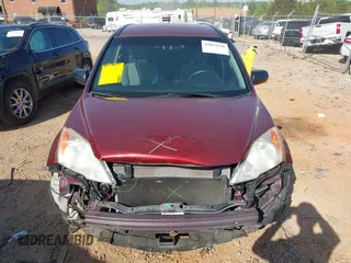 2011 Honda CR-V SE with VIN JHLRE4H48BC005457, listed as a IAAI auction lot 42073678 with 123,620 mi miles and . Bid and sale history available at DreamBid. Image 12.