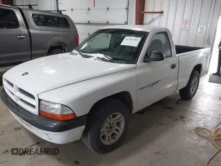 2001 Dodge Dakota with VIN 1B7FL26XX1S304511, listed as a IAAI auction lot 41246101 with 117,457 mi miles. Bid and sale history available at carsss.com. Image 2.