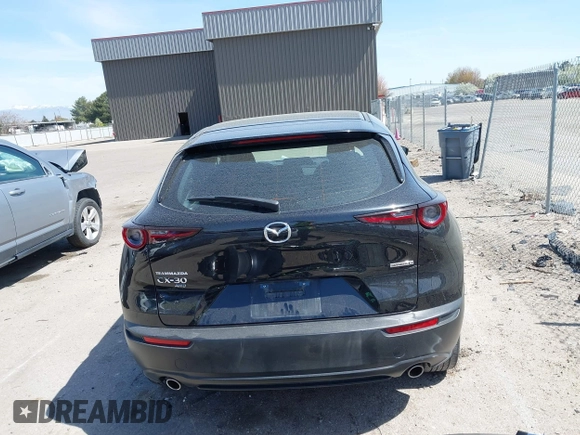 2021 Mazda CX-30 S with VIN 3MVDMBAL6MM302498, listed as a IAAI auction lot 42012356 with 50,477 mi miles and . Bid and sale history available at DreamBid. Image 17.