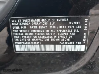 2012 Volkswagen Passat SE with VIN 1VWBP7A38CC033611, listed as a IAAI auction lot 41855933 with 155,429 mi miles. Bid and sale history available at carsss.com. Image 9.