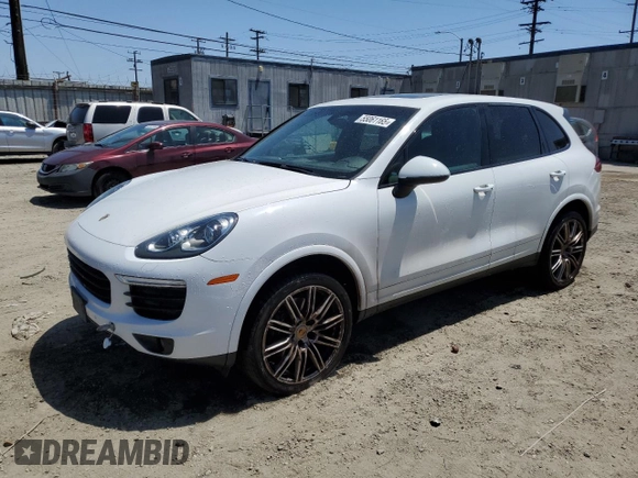 2018 Porsche Cayenne z VIN WP1AA2A29JKA01259, wystawiony jako Copart lot #55061165 z przebiegiem 100 451 mil mil oraz Czysty tytuł • Clean title. Historia ofert i sprzedaży dostępna na DreamBid. Obrazek 1.