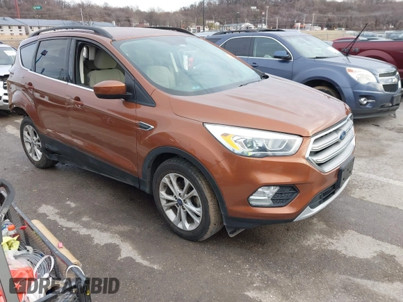 2017 Ford Escape SE with VIN 1FMCU0GD5HUE08097, listed as a IAAI auction lot 41499800 with 70,911 mi miles. Bid and sale history available at carsss.com. Image 1.