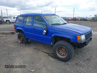 1996 Jeep Grand Cherokee Laredo с VIN 1J4GZ58YXTC329037, выставлен на аукционе IAAI как лот 42051175 с пробегом 314 571 миль миль и . История ставок и продаж доступна на DreamBid. Изображение 1.