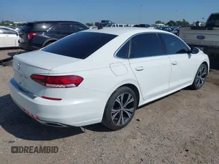 2021 Volkswagen Passat SE with VIN 1VWSA7A30MC000802, listed as a IAAI auction lot 42007087 with 190,171 mi miles and . Bid and sale history available at DreamBid. Image 4.