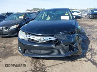 2013 Toyota Camry L with VIN 4T1BF1FK1DU666784, listed as a IAAI auction lot 41869487 with 99,396 mi miles. Bid and sale history available at carsss.com. Image 12.