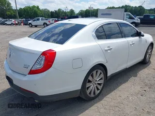2013 Lincoln MKS EcoBoost with VIN 1LNHL9FT0DG606567, listed as a IAAI auction lot 42561162 with 285,830 mi miles and . Bid and sale history available at DreamBid. Image 4.