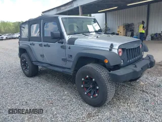 2014 Jeep Wrangler Unlimited Sport with VIN 1C4BJWDG3EL135351, listed as a IAAI auction lot 41947408 with 104,460 mi miles. Bid and sale history available at carsss.com. Image 1.