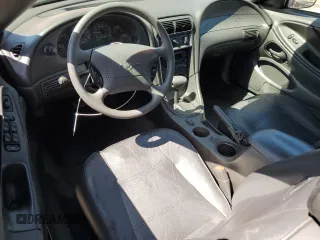 2003 Ford Mustang Deluxe с VIN 1FAFP44463F438457, выставлен на аукционе Copart как лот 57599045 с пробегом 41 349 миль миль и Списание • Salvage title. История ставок и продаж доступна на DreamBid. Изображение 8.