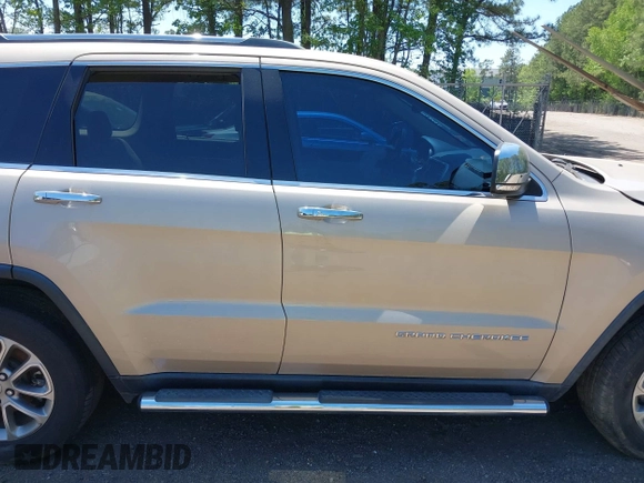2015 Jeep Grand Cherokee Limited with VIN 1C4RJFBG2FC643264, listed as a IAAI auction lot 42151555 with 116,797 mi miles. Bid and sale history available at carsss.com. Image 13.