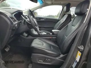 2015 Ford Edge Titanium z VIN 2FMTK4K84FBB09582, wystawiony jako Copart lot #55801915 z przebiegiem 72 533 mil mil oraz Szkoda całkowita • Salvage title. Historia ofert i sprzedaży dostępna na DreamBid. Obrazek 7.