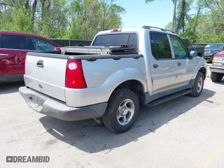 2005 Ford Explorer Sport Trac XLS with VIN 1FMZU77K75UB52008, listed as a IAAI auction lot 42103222 with 65,007 mi miles. Bid and sale history available at carsss.com. Image 4.